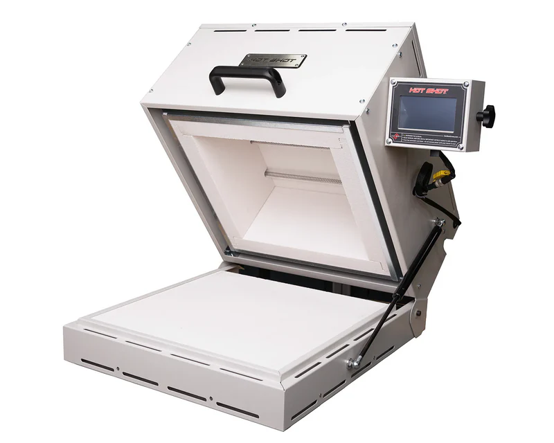 Hot Shot HS-12G glass kiln open clamshell design showing interior chamber and removable floor