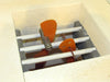Jen-Ken Vertical Air Bath EDC Knife Kiln loaded with blades hanging vertically