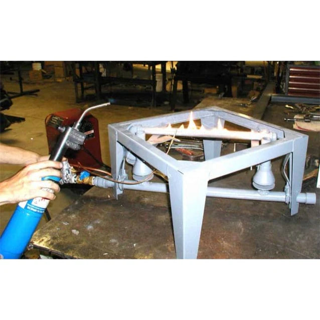 Olympic Kilns 2827G updraft gas kiln ignition setup showing flame test on burner system