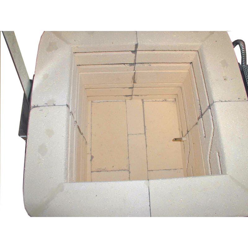 Interior view of Olympic Traveler kiln showing firebrick chamber and heating elements