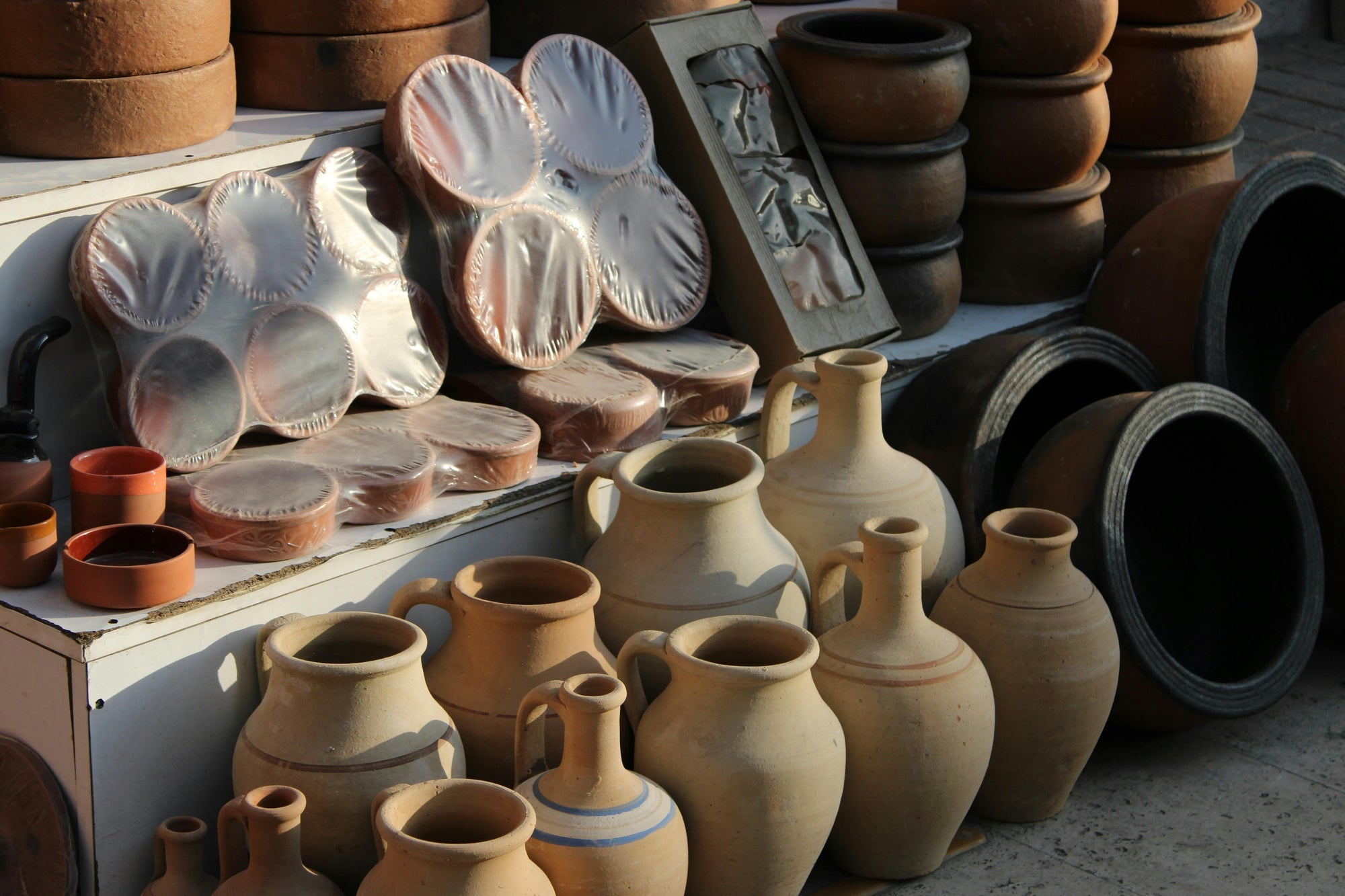 Pottery forms and vessels in a working studio
